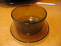 Smoke-colored glass bowl with sauce, soup and muesli