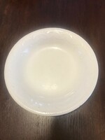 Granite porcelain deep plate, with a damaged edge. White. 22 Cm
