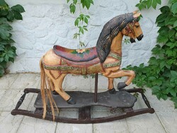 Painted wooden rocking horse