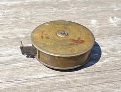 Calderoni and his companion from Budapest, old copper case measuring tape