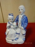 German porcelain figure, a couple sitting on a bench. He has! Jokai.