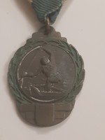 Antique sports medal with ribbon