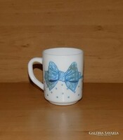 Milk glass mug with French face and bow pattern (3/k)