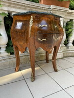 A wonderful small chest of drawers with a marble top