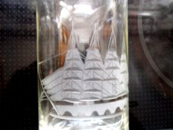 Polished glass with a picture of a sailing ship