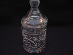 Covered glass holder with a meandering pattern