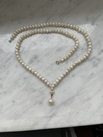 Real pearl 47.5 cm long, very beautiful 14 kr. With gold.