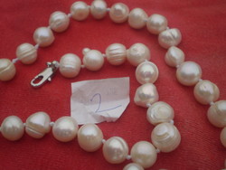 Cultured pearl necklaces .2.. With chain extension