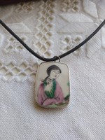 Antique porcelain, hand-painted geisha pendant with silver frame and leather chain
