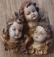 Antique, hand-carved putto wall decoration