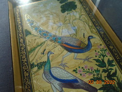 Handmade batik oriental peacock picture, glazed with paspartu, under glass