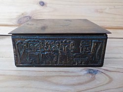 A bronze box made by an industrial artist with a wooden insert