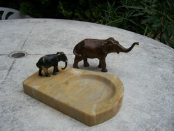 2 Solid copper small elephant statue figures on one of the marbles