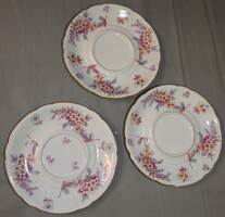 Antique set of three coasters with a rose pattern