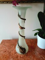 Broken vase with copper decoration