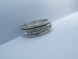 Silver ring with rotatable mantra and inscription