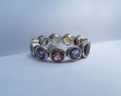 Silver ring with many precious stones, chakra ring