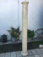 Dilapidated old wooden column