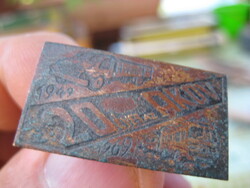 20  Éves az AKÖV    1949- 1969    . évekből ,  vörösrézből , 60 x 18 mm