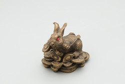 Money bunny. Feng shui bronze rabbit figure
