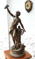 Antik bronz színű francia spelter figura, kereskedelem címmel