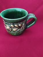 Green glazed mug with convex pattern