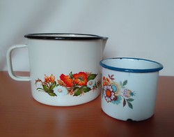 Two retro vintage old enamelled mugs with spouts, kitchen utensils, with folk floral design