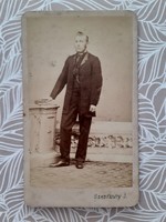 Antique photo of a man by photographer István Szentkuty from Pest, old studio photo