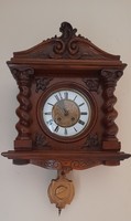Antique richly carved half-baked library clock