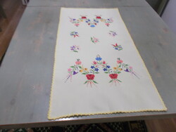 Kalocsa tablecloth embroidered on yellow material