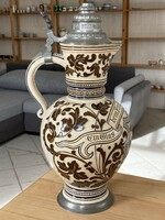 German ceramic jug with a large tin cap