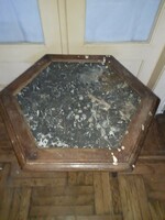 Old German hexagonal carved table with marble insert in smoking salon