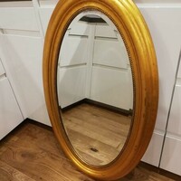 Arany keretes, klasszikus vonalvezetésű tükör (58 x 95 cm)