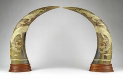 1H188 large carved dragon patterned horns pair of horns on wooden pedestal 34 cm