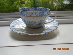 Antique ribbed tea cup with coaster with 