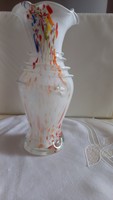 Handcrafted vase made of milk glass, colored in material, with ruffled edges, decorated with glass fiber at the neck.