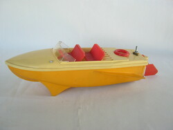 Retro plastic toy speedboat