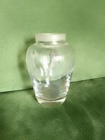 Old, small-sized, beautifully shaped glass vase with a polished pattern
