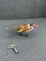 Retro fém madár kulccsal
