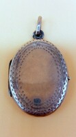 Antique silver photo pendant with engraved decoration