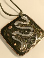 Fire enamel pendant on a leather strap, 4.5 x 4.5 cm