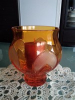 Modern mécsestartó - váza narancssárga színnel, körbe az oldalán aprólékos mintával.