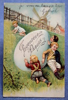 Antik dombornyomott Húsvéti üdvözlő litho képeslap gyerekek hatalmas guruló tojással