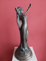 Bronze nude statue. Patinated bronze statue of a ball player