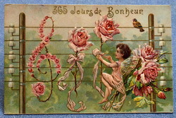 Antik dombornyomott Újévi üdvözlő litho képeslap angyalka  hangjegyes villanypóznán rózsák kismadár