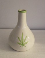 Ceramic vase with cannabis leaf decoration