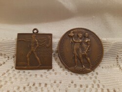2 bronze emblems or mini plaques