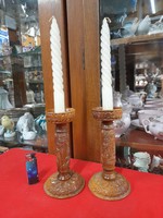 Pair of hand-carved wooden candle holders with folk motifs. 18.5 cm.