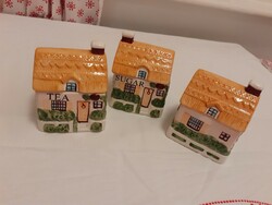 Ceramic cottage with a yellow lid as well as a tea sugar coffee holder