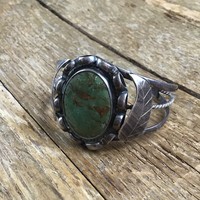 Old Navajo silver bracelet with green turquoise